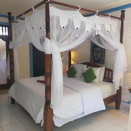 Puri Oka Beach Bungalows จันดีดาซา ภายนอก รูปภาพ
