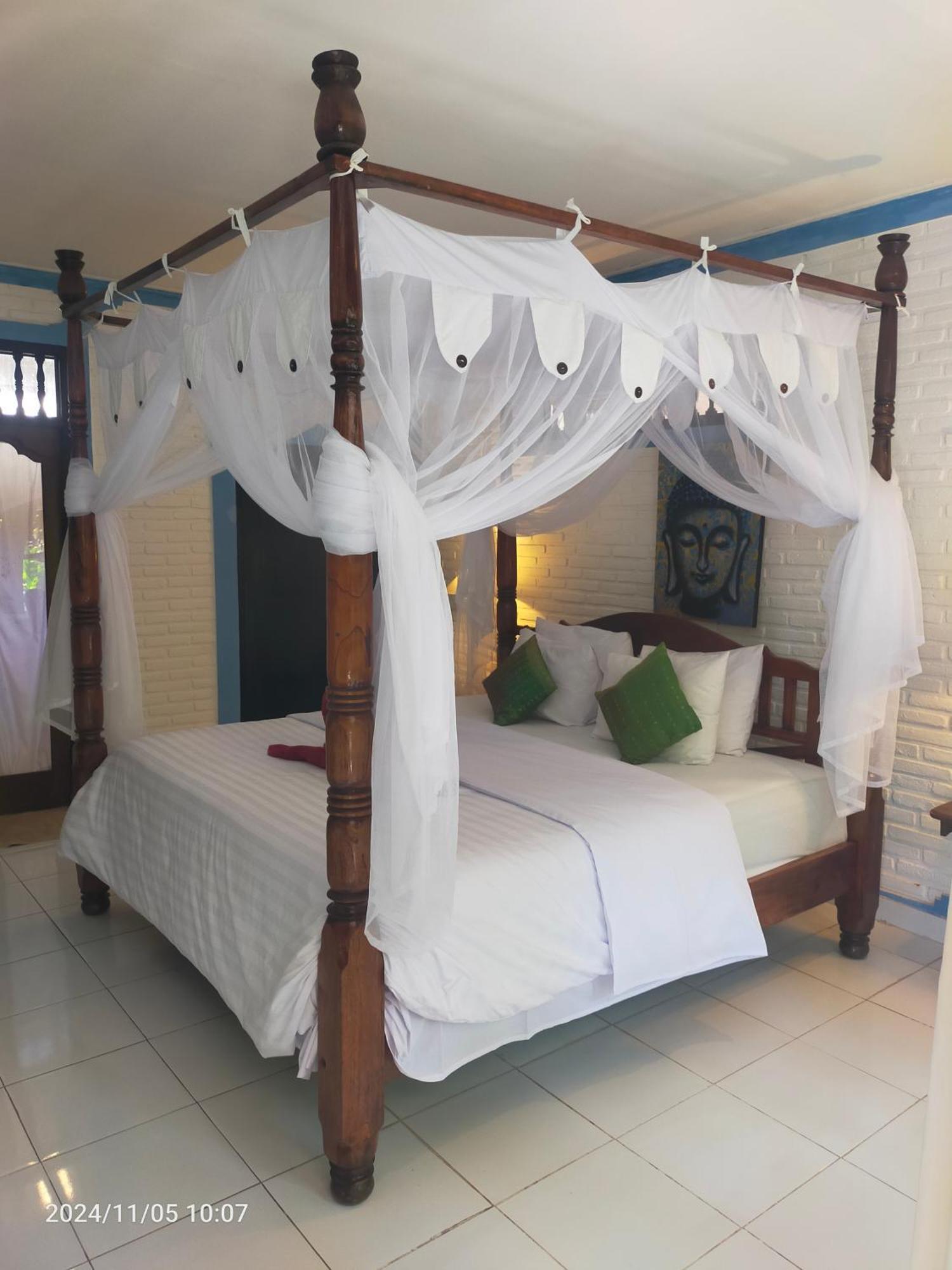 Puri Oka Beach Bungalows จันดีดาซา ภายนอก รูปภาพ