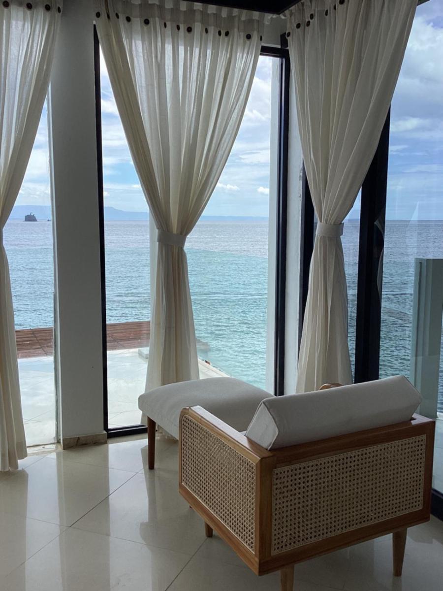 Puri Oka Beach Bungalows จันดีดาซา ภายนอก รูปภาพ