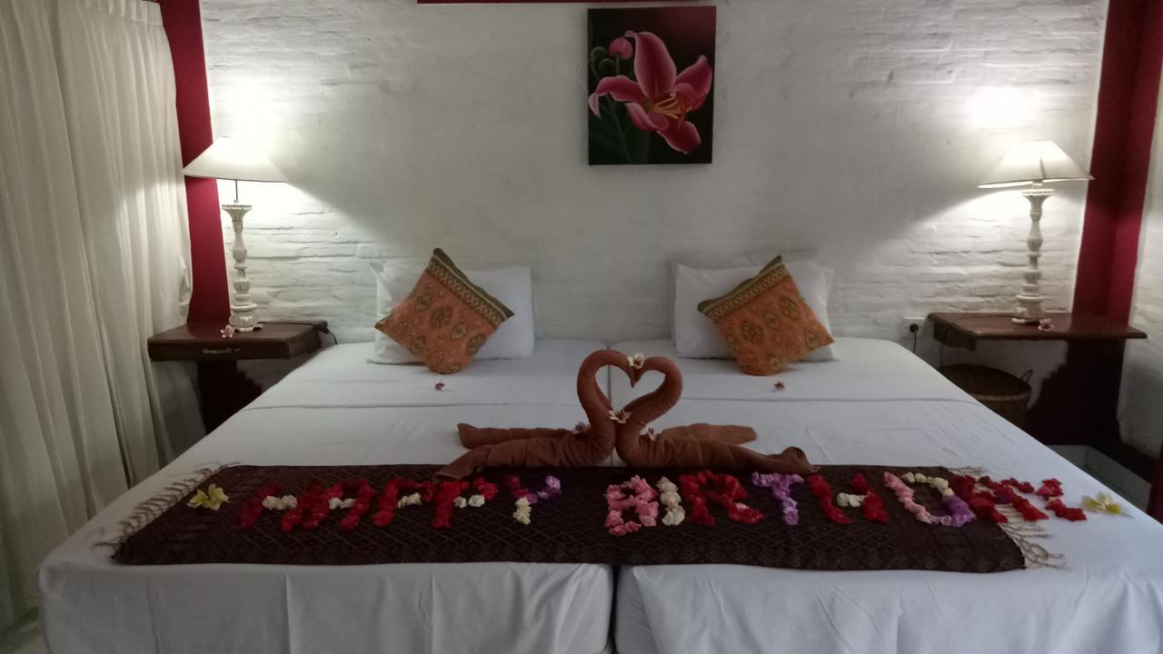 Puri Oka Beach Bungalows จันดีดาซา ภายนอก รูปภาพ