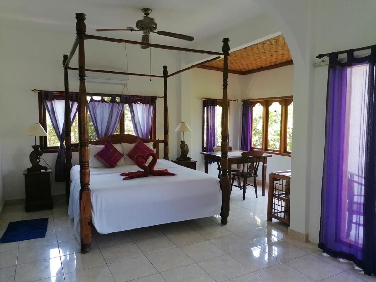 Puri Oka Beach Bungalows จันดีดาซา ภายนอก รูปภาพ